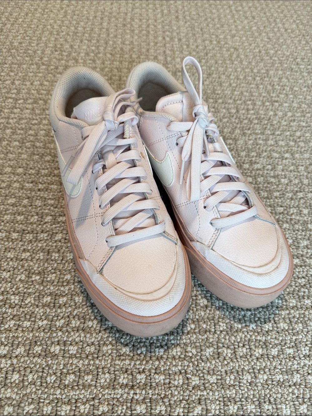 Nike Light Pink Low-Top Sneakers with White Swoosh